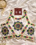 WhatsApp Image 2026-04-12 at 12.14.50 PM (1) Navratri Gopika Gamthi blouse with colorful thread work, real mirror work and kodi latkan in heavy silk white sleeveless