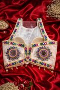 WhatsApp Image 2026-04-12 at 12.14.50 PM Navratri Gopika Gamthi blouse with colorful thread work, real mirror work and kodi latkan in heavy silk white sleeveless